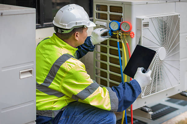 Professional Hvac technician working in Toney, AL